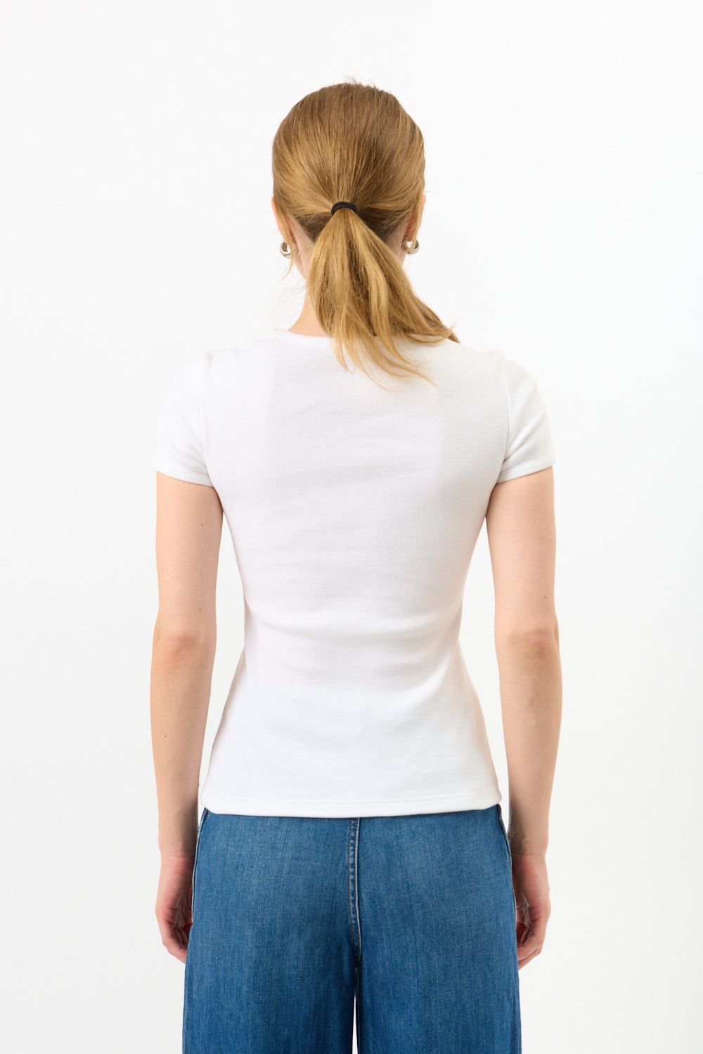 Jeans Chanel con tasca a cuore