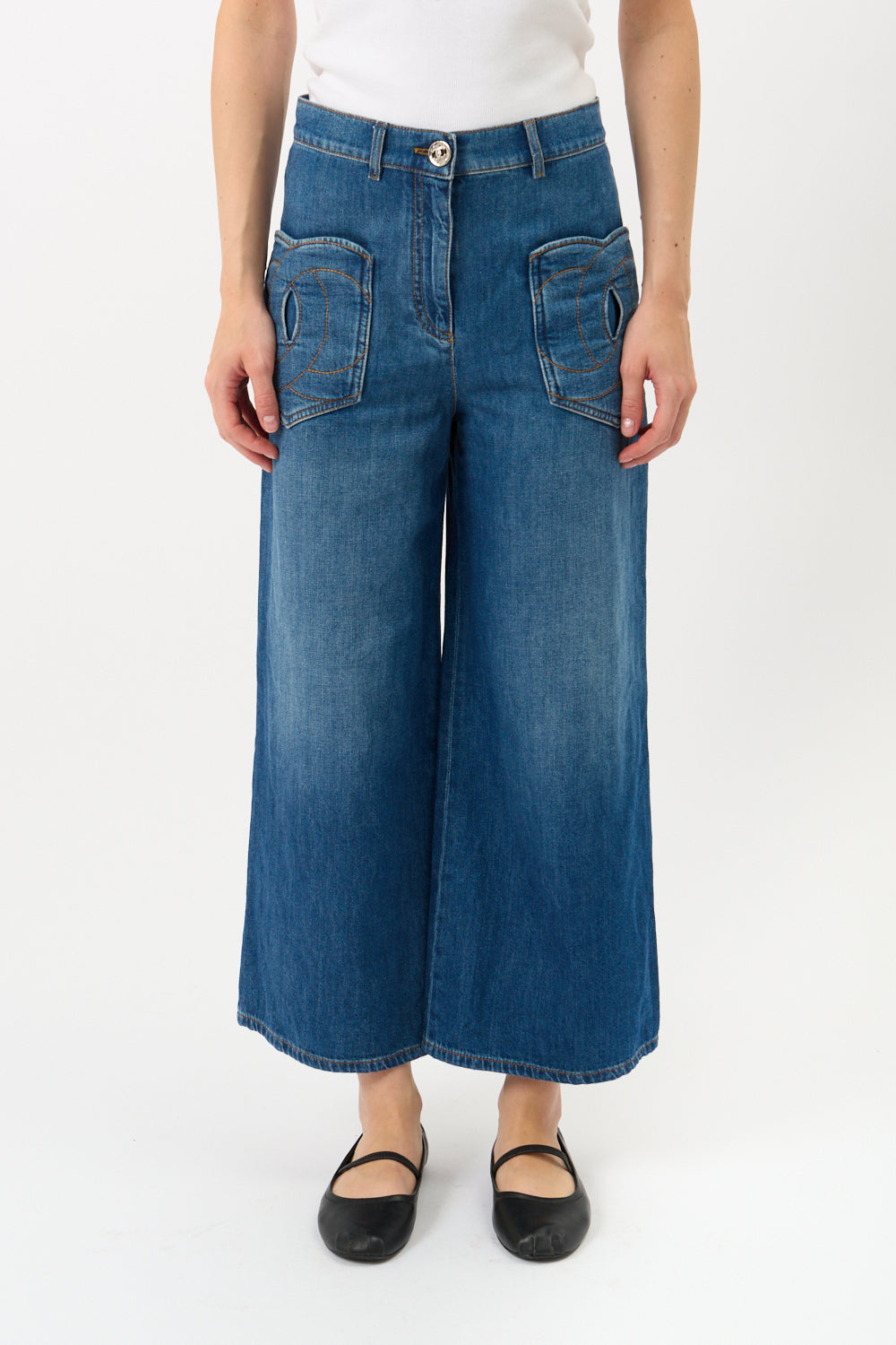 Jeans Chanel con tasca a cuore