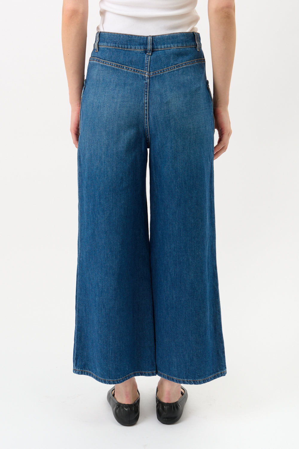 Jeans Chanel con tasca a cuore