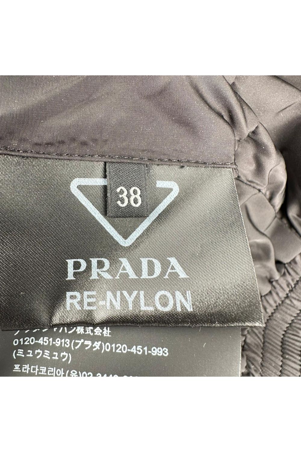 Prada Re-Nylon Cropped Down Jacket in Black Polyamide