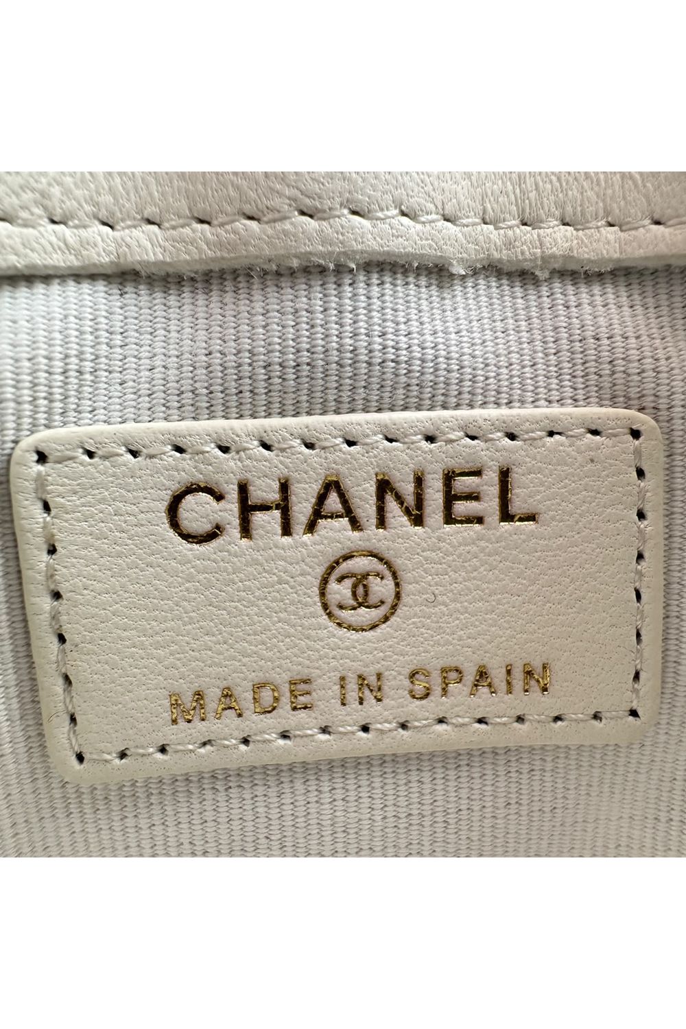 Chanel Quilted Mini Square Clutch in Ivory Leather