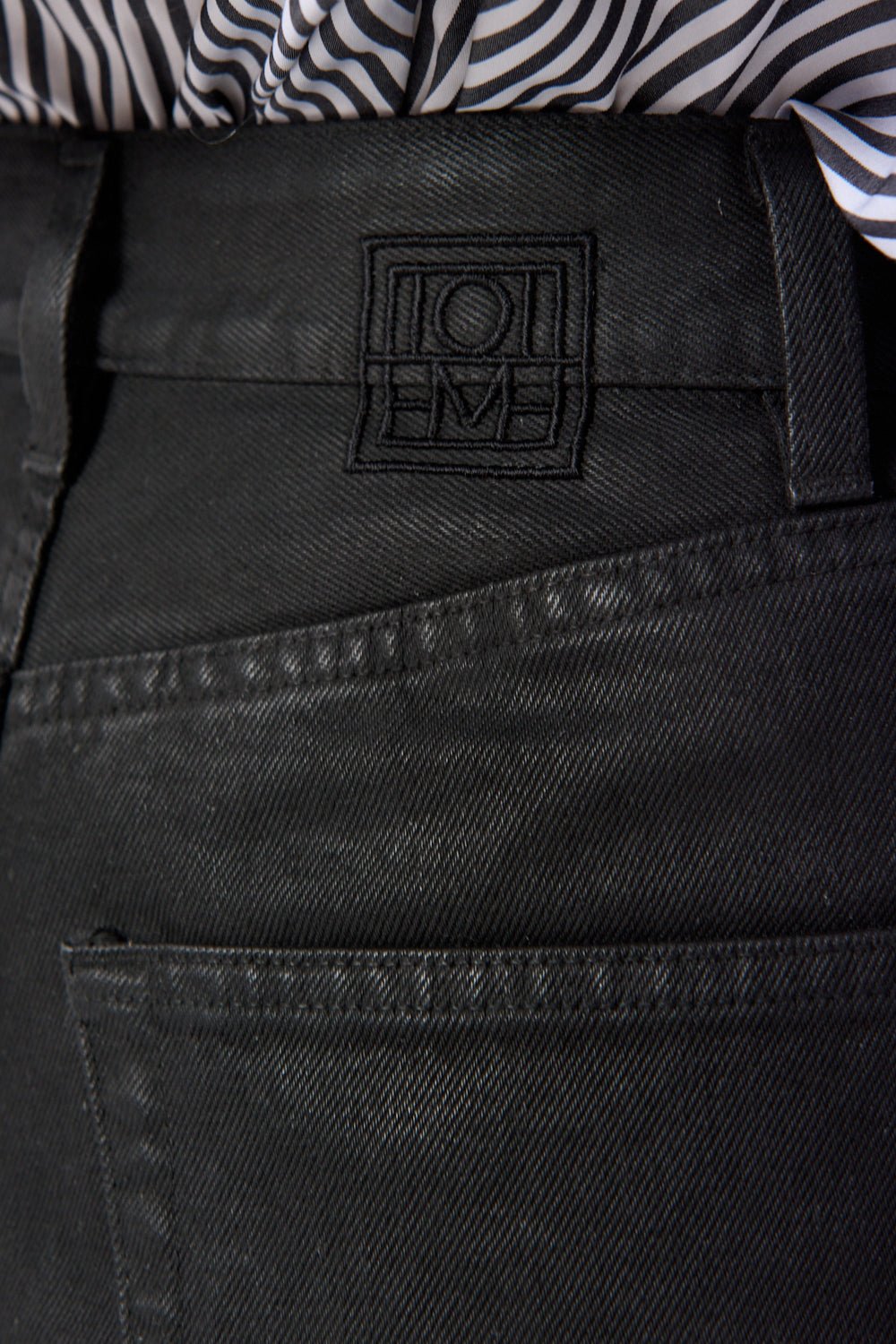 Toteme Coated Tapered Leg Denim - Bessette