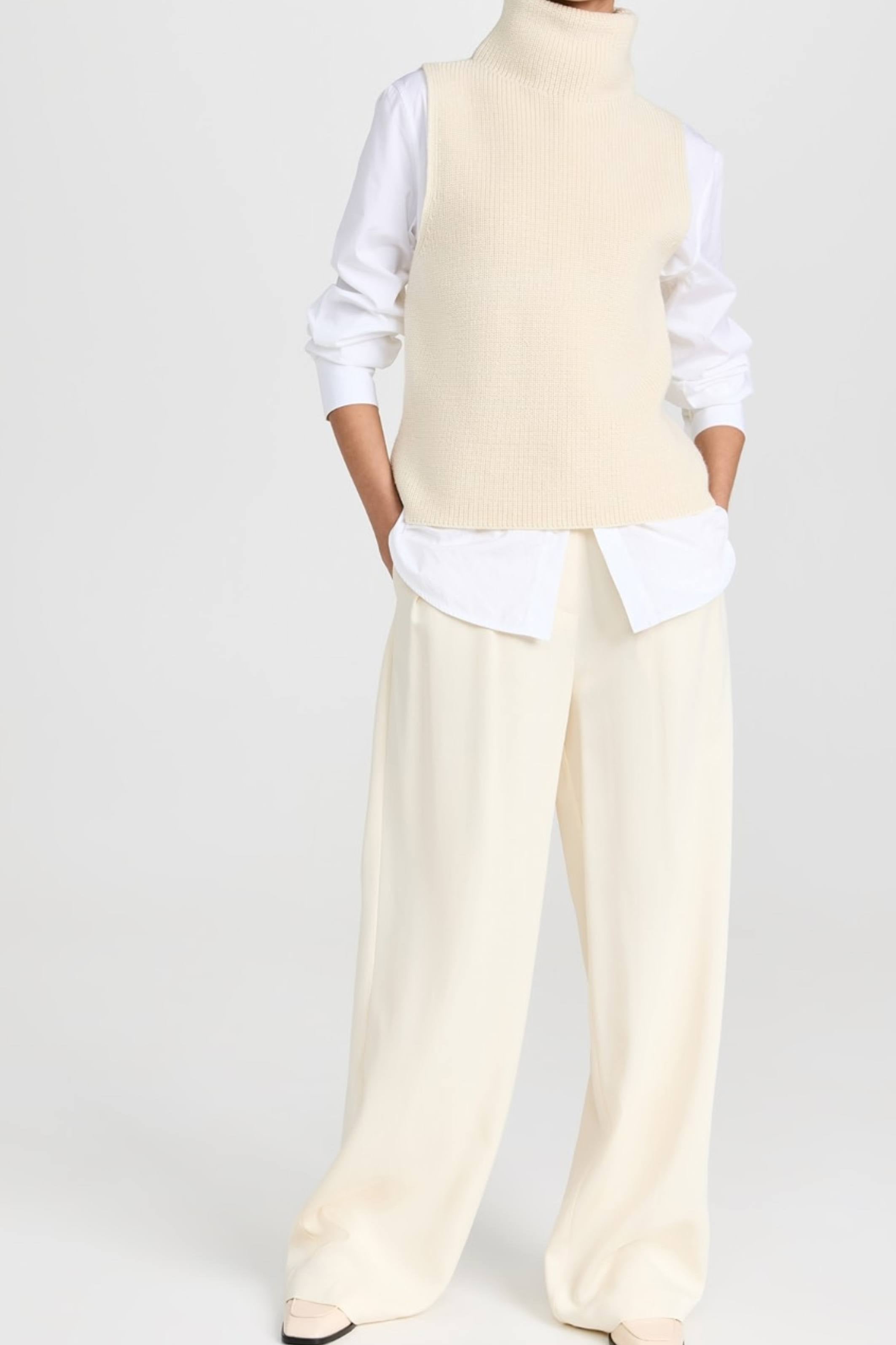 Sleeveless funnel neck sweater