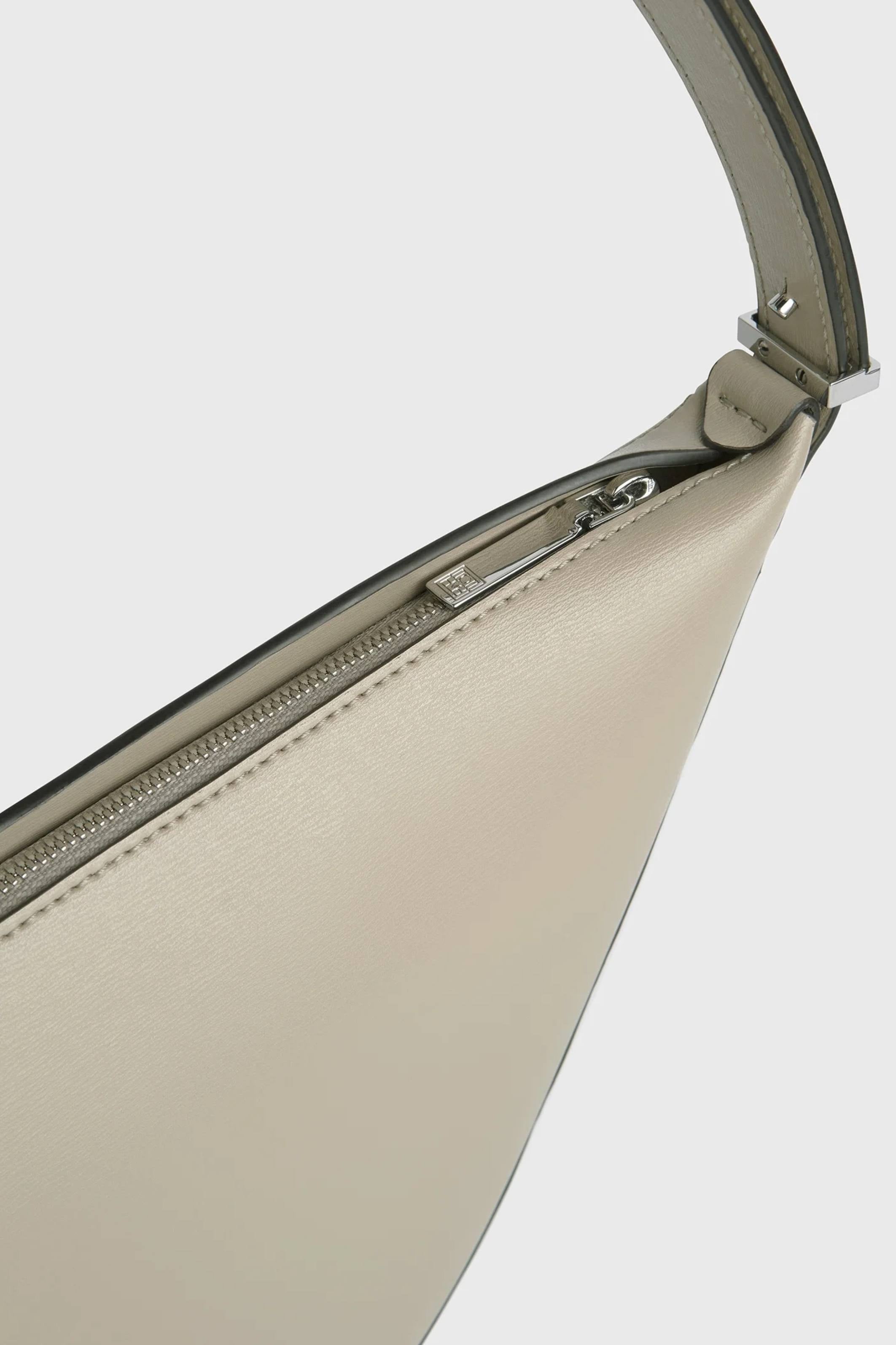 The Scooped Sling Bag
